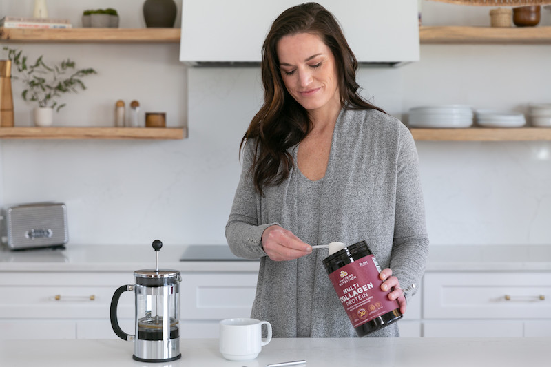 woman scooping collagen