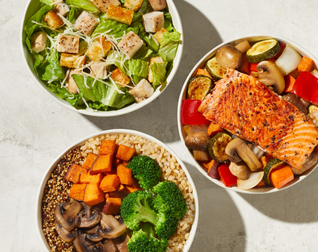 Aerial view of three different prepared meals